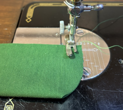 Sew the zipper guard