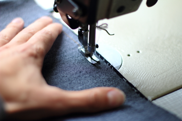 A piece of denim is sewn with good
sides together A piece of denim is sewn with good sides
together.